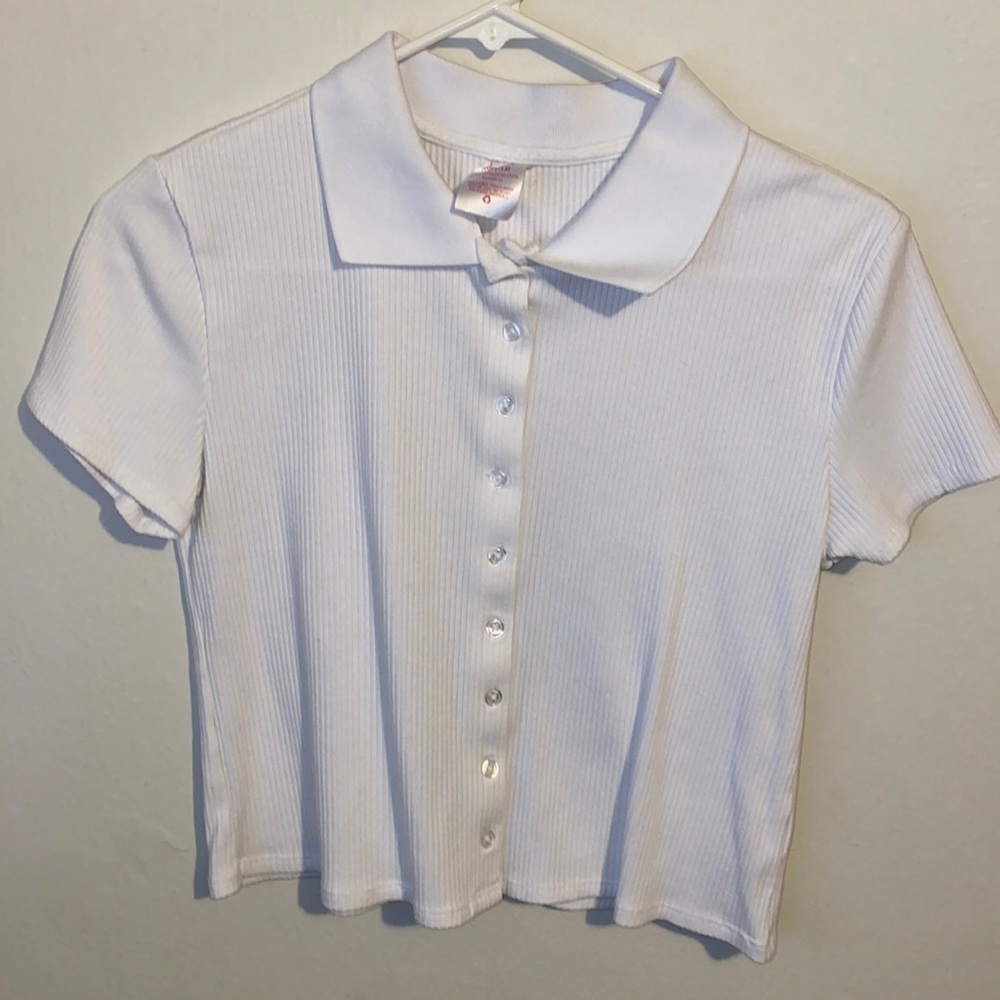 Girl’s white, size L, collared ribbed shirt.